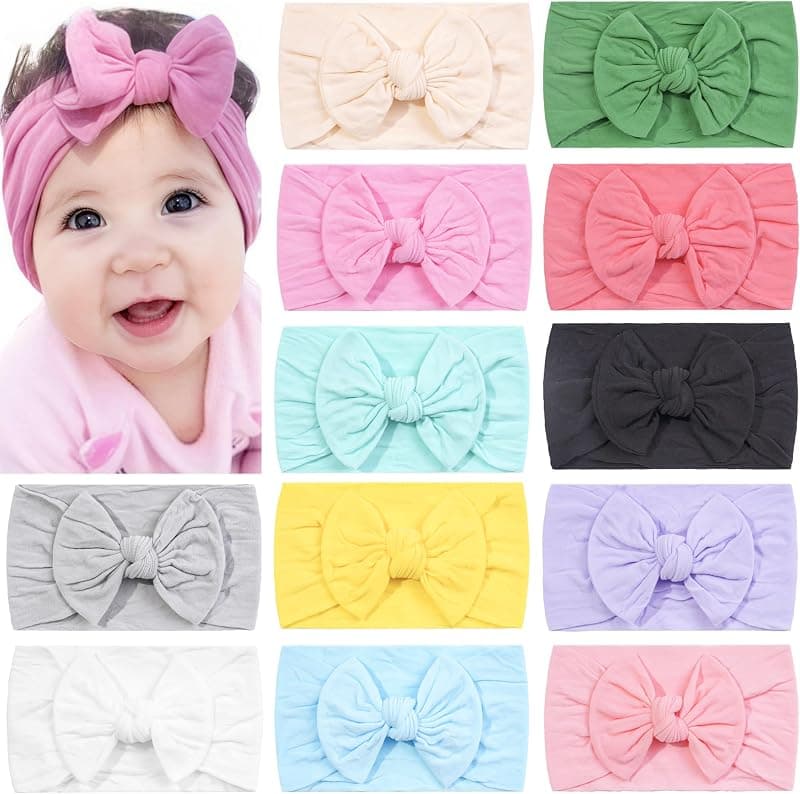 Twelve stretchy bow headbands in soft pastel colours