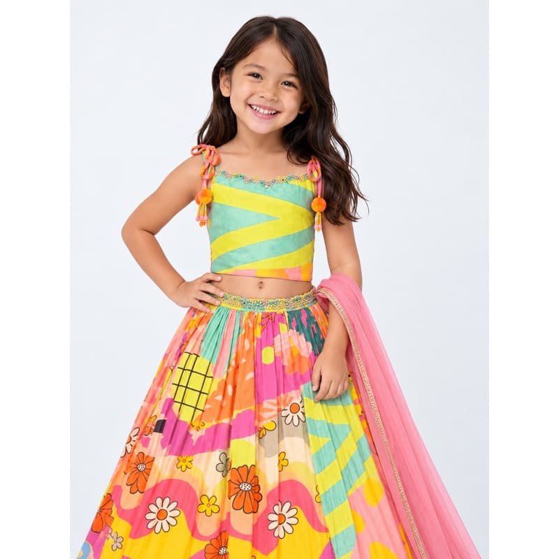 Bright multicolour lehenga set with a crop top, printed skirt and pink dupatta