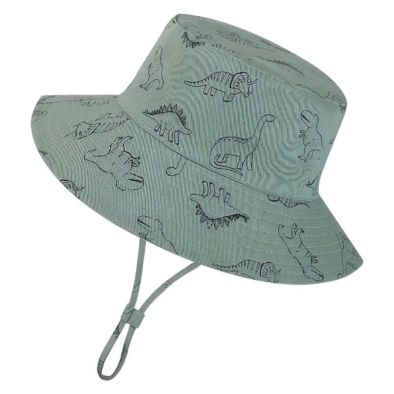 Sage green bucket sun hat with a dinosaur print and chin strap