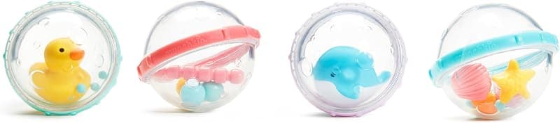 Four clear Munchkin bath bubbles with small toys inside