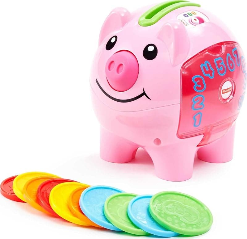 Pink Fisher-Price piggy bank toy with colourful coins
